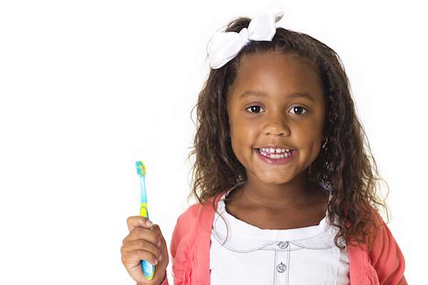 Should I Take My Child To A Kid Friendly Dentist In North Attleborough For White Spots On Teeth?
